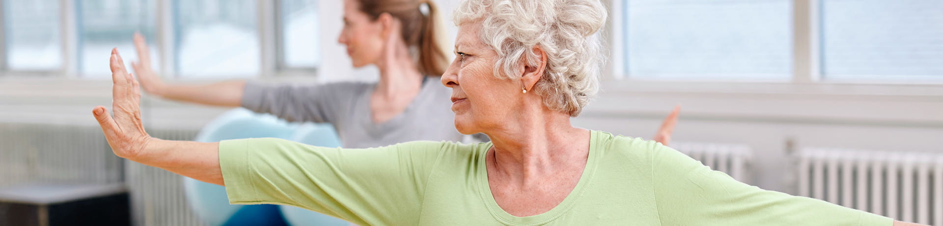 "nurse listening to patients heart"