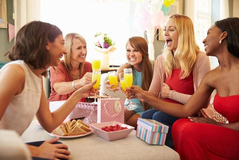 women-gathered-with-presents-to-celebrate-pregnancy