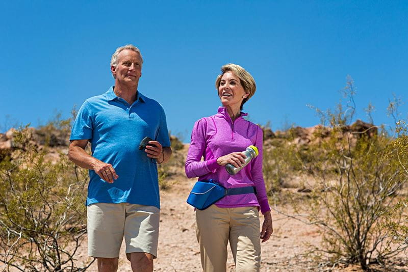 1-older-couple-walking-in-desert
