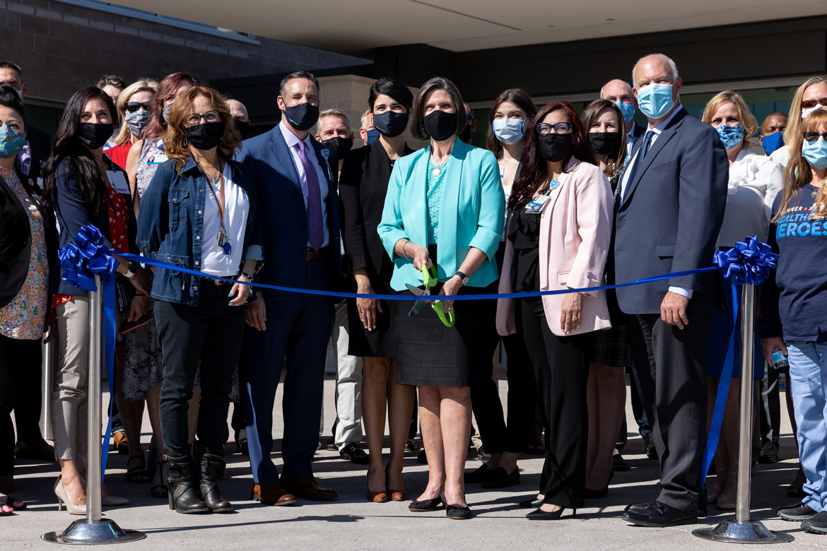 Banner Health Chief Operating Officer Becky Kuhn cuts ribbon