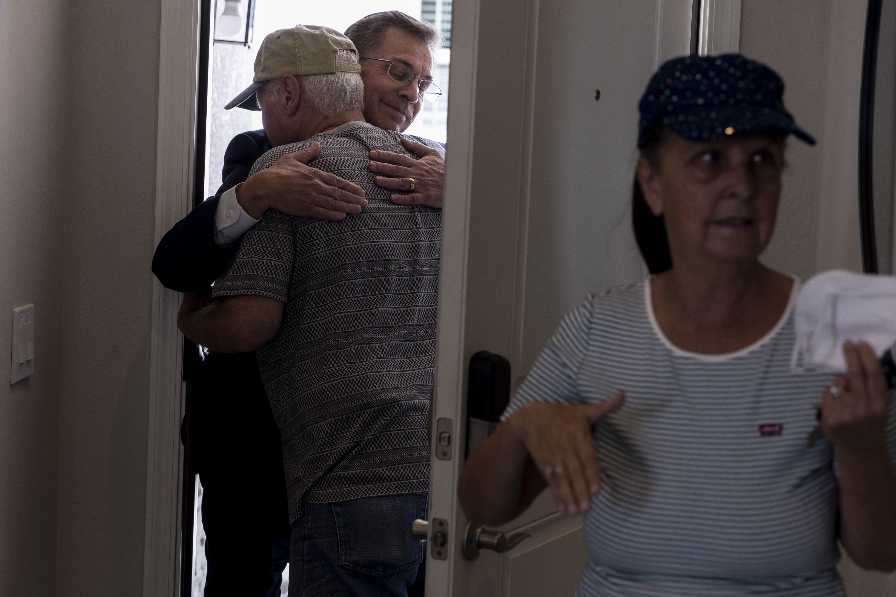 Cancer patient Jac Conant hugs Todd Wood, CEO of Christopher Todd Communities, after touring his new home